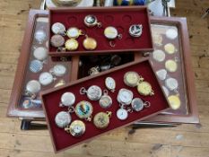 Collection of pocket watches with two three drawer cabinets.