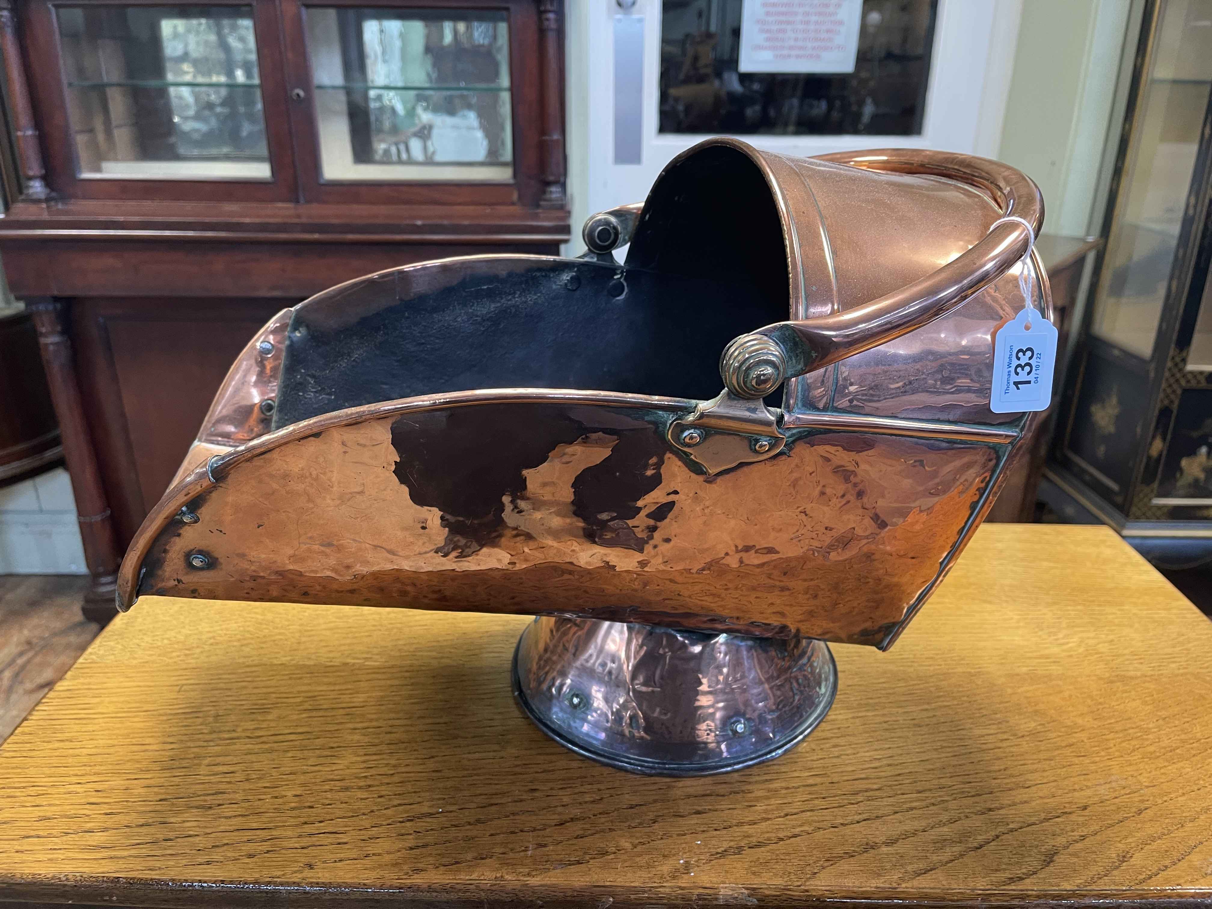 Victorian copper swing handled coal scuttle, 32cm high.