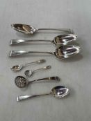 Three George III silver tablespoons and four other spoons (7).