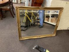 Gilt framed rectangular bevelled wall mirror, 114cm by 89cm.