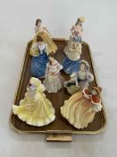 Collection of eight Royal Doulton ladies.