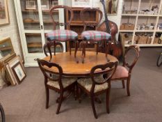 Victorian oval mahogany breakfast table and seven Victorian balloon back dining chairs including