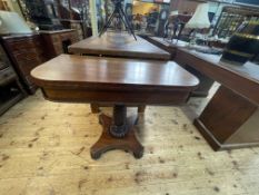 Victorian mahogany fold top tea table raised on twist pedestal to quadripartite base, 75.