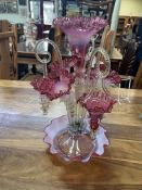 Victorian vaseline pink glass six branch trumpet epergne, 46cm high.