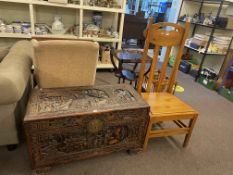 Oriental carved camphorwood trunk, 58.5cm by 105cm by 52cm, and high back side chair.