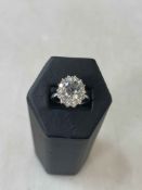 Stunning 2.5 carat aquamarine and 0.9 carat diamond cluster, 18 carat white gold ring, size N.