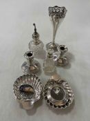 Silver pieces including spill vase, pair shell butter dishes, dwarf candlesticks, two scent bottles,