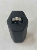 Good 1.55 carat diamond three stone, 18 carat white gold ring, size N.