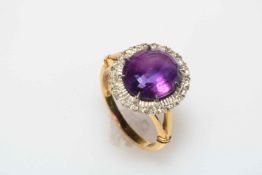 4 carat amethyst and diamond cluster 18 carat gold ring, size M.