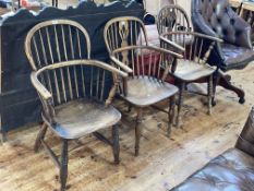 Three antique Windsor elbow chairs, one with crinoline stretcher.