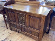 Oak two drawer kist with carved and linen fold panels, 71.5cm by 99cm by 45cm.