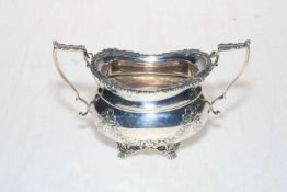 Edwardian silver sugar basin with floral swags and scroll paw feet, Sheffield 1906,