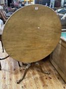 Antique circular mahogany supper table on pedestal tripod base, 72cm by 88.5cm diameter.