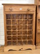 Pine thirty bottle wine cabinet, 83cm by 58.5cm by 26cm.