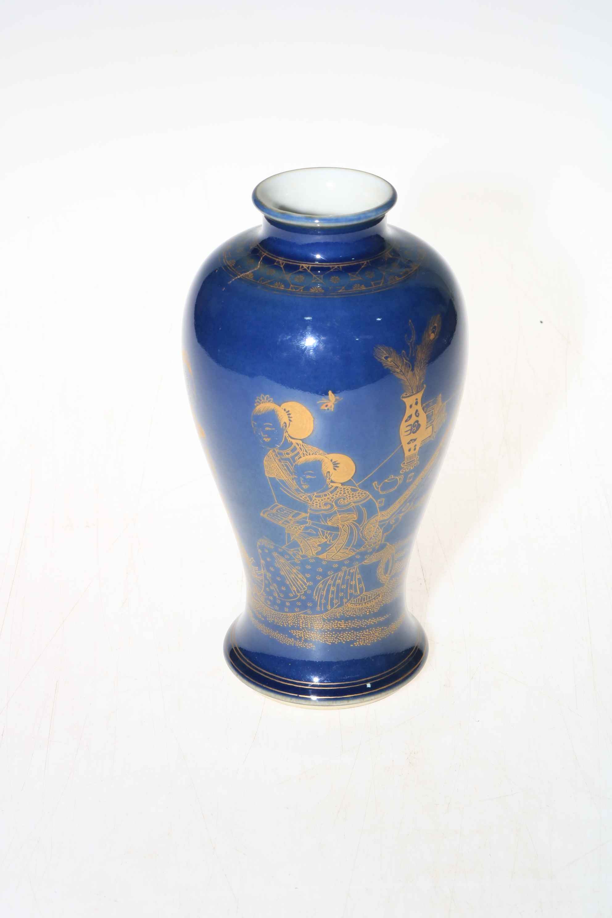 Chinese baluster vase with gilt female figure decoration on blue ground, 19.5cm.