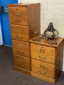 Pair matching oak finish four drawer and two drawer filing cabinets.