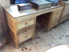 Robert Thompson of Kilburn 'Mouseman' adzed oak six drawer pedestal dressing table,