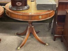 Mahogany four drawer pedestal drum table with leather inset top, 77cm by 92cm diameter.