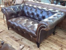 Barker & Stonehouse brown deep buttoned and studded leather Chesterfield settee,