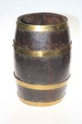 Oak and brass bound barrel stick stand, 39cm high.