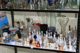 Assorted glassware, collection of china and glass bells, figures, etc.