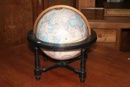 Terrestrial globe on stand, 41cm high.