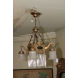 An Edwardian brass and glass four branch ceiling light, a lustre drop five branch ceiling light,