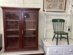 Stained pine two door glazed bookcase, four bar towel rail and child's chair (3).