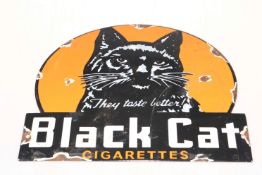 Enamel sign for Black Cat Cigarettes, 30cm across.