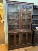 Early 20th Century mahogany cabinet bookcase having four glazed panel doors, 217cm by 125cm by 48cm.