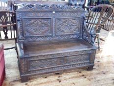 Victorian carved oak box hall bench, 101cm by 121cm.