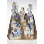 Eleven Lladro figures and groups.