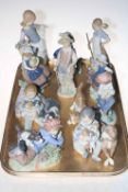 Eleven Lladro figures and groups.