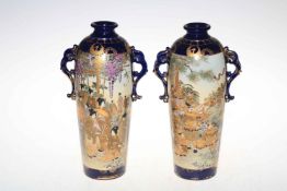 WITHDRAWN Pair Satsuma vases with panels of figure decoration, 31cm.