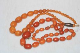 Two untested amber bead necklaces.