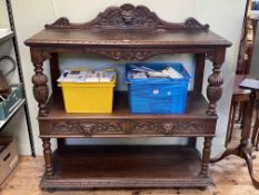 Victorian carved oak three tier dumb waiter having two lion mask drawers, 129cm by 122cm by 47cm.