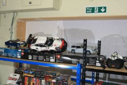 Three Lego car kits including 10265, 42096 and 10262.