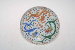 Chinese porcelain dragon decorated plate with six red character mark to base, 21cm diameter.