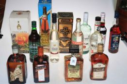 Fourteen bottles of spirits including two Cointreau, Amaretto, Bacardi, Pimm's, etc.