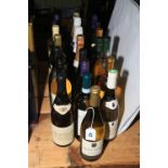 Twenty two bottles of white wine including Asti, Saint Andre, Kourtaki, etc.