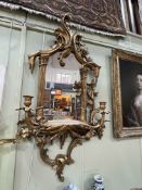 Ornate gilt framed two branch girandole, 147cm by 79cm.