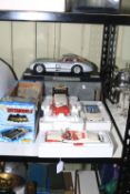 Collection of Diecast toy vehicles including Batmobile, Revell, etc.