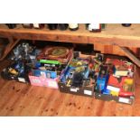 Four boxes of Diecast toy cars, board game, books, etc.