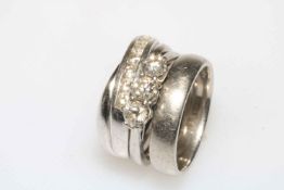 Trio of rings, three stone diamond engagement ring and seven stone half eternity ring,