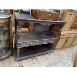 Victorian carved oak three tier dumb waiter having two lion mask drawers, 129cm by 122cm by 47cm.