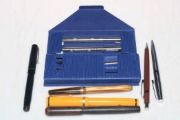 Swan Leverless, Eagle Pencil Co and Watermans fountain pens, each with 14k nibs,