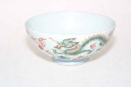Chinese dragon decorated bowl with blue painted six character mark to base, 18.5cm diameter.