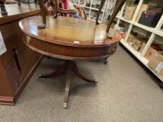 Mahogany four drawer pedestal drum table with leather inset top, 77cm by 92cm diameter.