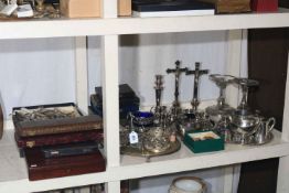 Collection of silver plated wares including cased cutlery, candle holders, serving trays, etc.