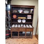 Antique oak three drawer potboard dresser with shelf back, 199cm by 141cm by 40cm.